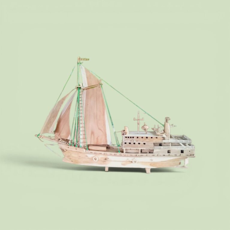 Handcrafted Teak Sailboat Sculpture – Detailed Maritime Wood Art